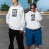 mockup featuring a man and a woman in matching oversized pullover hoodies m36823