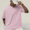 mockup of a man wearing a wide t shirt at a studio m262331