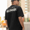 back view mockup of a man wearing an oversized t shirt and sunglasses m25264